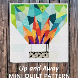 Make a Up and Away mini for your next quilt swap or as a gift. This 18″ x 18″ foundation paper pieced quilt is great as a wallhanging — add a border to make an oversized pillow or make multiple blocks and construct a larger quilt! This is the perfect pattern to use up your fabric scraps! If you need additional fabric to complement your stash, charm packs and fat eighths work well with this pattern. This tested pattern contains both detailed instructions and diagrams, making it easy to piece.