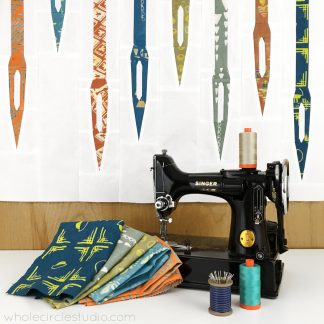 Sew Speedy! An easy foundation paper piecing pattern perfect for your sewing or quilting space. Makes a mini quilt and is the perfect gift for the sewist or quilter (or for yourself)!