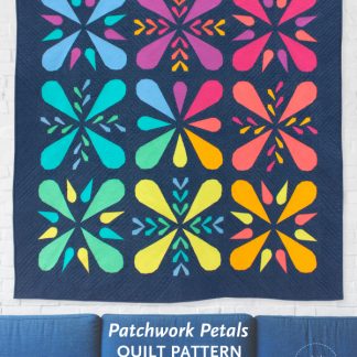 The Patchwork Petals quilt pattern is a PDF download that includes mini, wall and throw size. This modern design works well with prints or solid fabric.