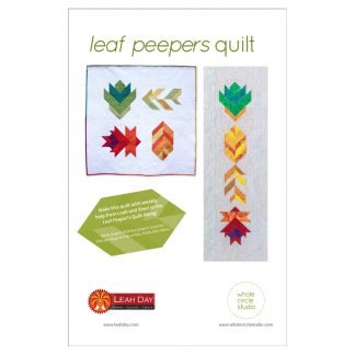 A fun, modern autumn wall hanging quilt or table runner! Leaf Peepers is a modern spin on the traditional half square triangle block. Join the sew along and quilt along and make this for your home or as a gift for Thanksgiving! Leah Day and Whole Circle Studio will walk you through all of the steps of this PDF pattern on their blogs.