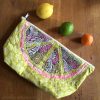 Sew and quilt Citrus Slices blocks, designed by Whole Circle Studio and make a Open Wide Zippered pouch by Noodlehead.