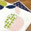Make this fresh, modern quilt for your home! Apple Turnover is a fun, foundation paper piecing pattern. Download the PDF pattern — instructions included for four sizes: mini, table runner, wall and throw. Use your scraps from your fabric stash, your favorite fat eighths, fat quarters, and yardage!
