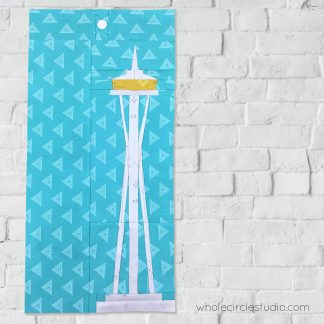 Space Needle | Seattle, Washington architecture quilt block made with Art Gallery Fabrics Elements / blenders. Foundation paper piecing quilt. Available at wholecirclestudio.com