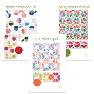 covers to 3 quilt patterns, one showing apples, one showing slices of citrus, one showing berries