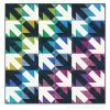 colorful graphic quilt with arrows arranged diagonally