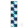 graphic quilt runner with arrow blocks and shades of blue