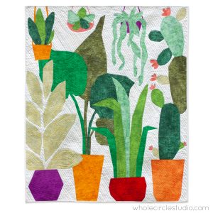 quilt of plants inside a greenhouse on a light background