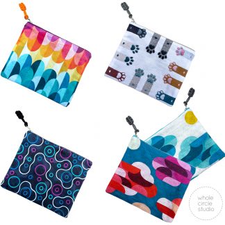4 zipper pouches with colorful quilt designs