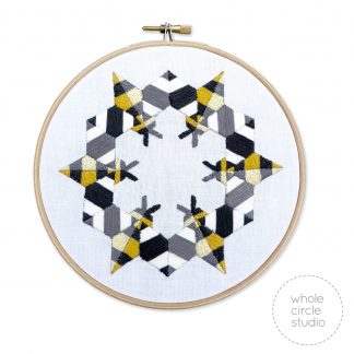 6 bees in a circle embroidered inside a hoop
