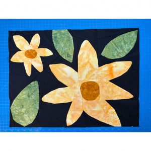 modern flower quilt block with batik fabrics