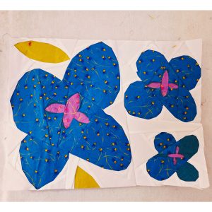 Modern floral quilt block showing bold geometric petals