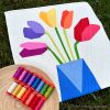 Modern tulip quilt with coordinating Aurifil thread collection