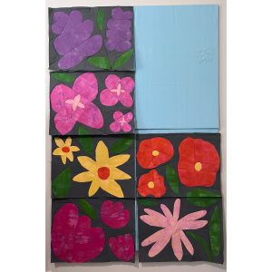 rows of colorful flower quilt blocks on a navy background